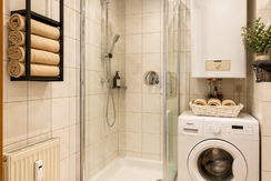 Modern Scandinavian bathroom with laundry area