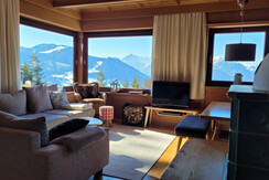 Wohnzimmer mit Kachelofen