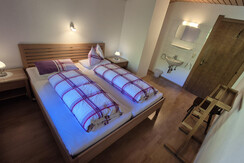 Kaiserhof_Alpbach_Doppelbett_Schlafzimmer